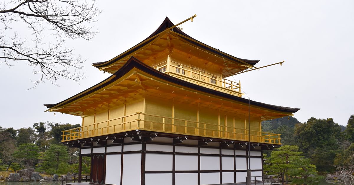 Kinkaku-ji golden pavilion reflecting in water