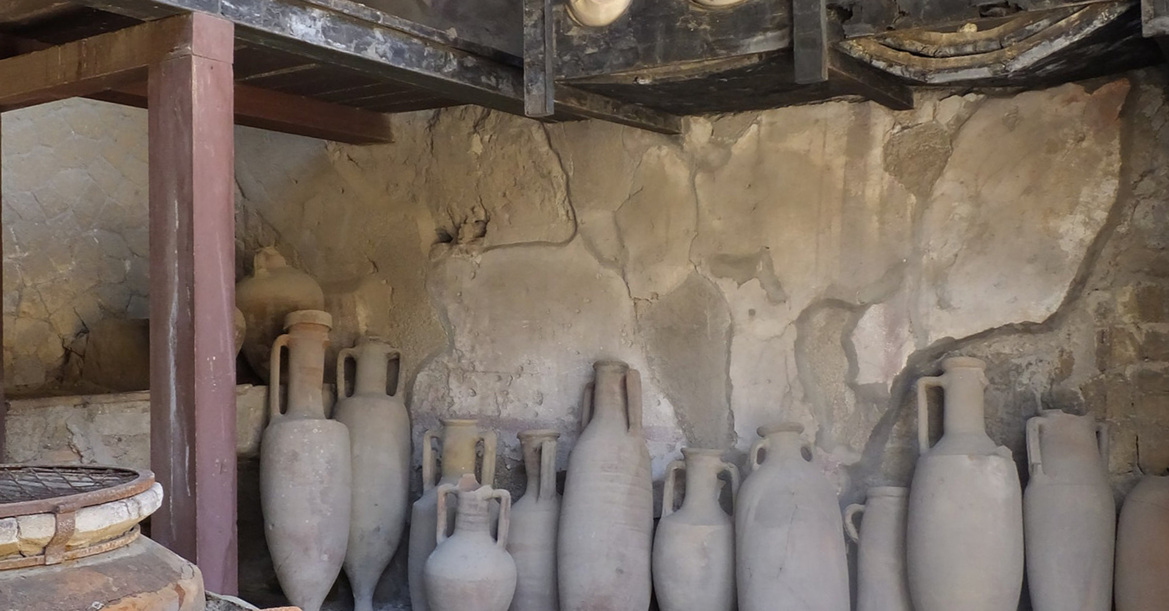 Amphorae on Wooden Racks in Herculaneum - World History Encyclopedia