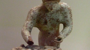 Terracotta Figurine of a Baking Woman