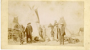 Eight Sioux in Front of Tipis on the Pine Ridge Reservation