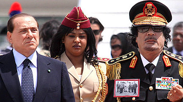 Gaddafi Wearing a Photo of Umar al-Mukhtar