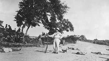 US Marine Poses with Dead Haitian Revolutionaries, 1915