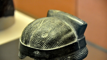 Stone Hair and Headdress of the God Lamma