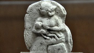 Woman Breastfeeding a Child
