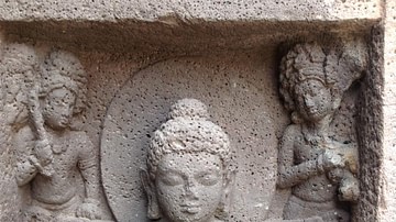 Seated Buddha Figure Displaying Dharmachakra Mudra
