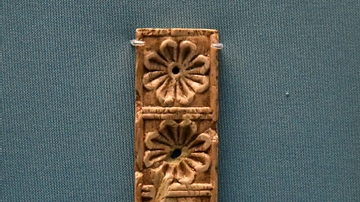 Small Nimrud Ivory Panel of Three Rosettes