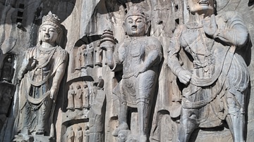 Longmen Grottoes - Attendants at Fengxiansi Cave