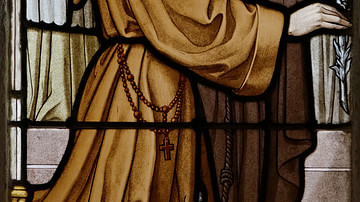 A Stained Glass Window Showing Two Franciscan Monks