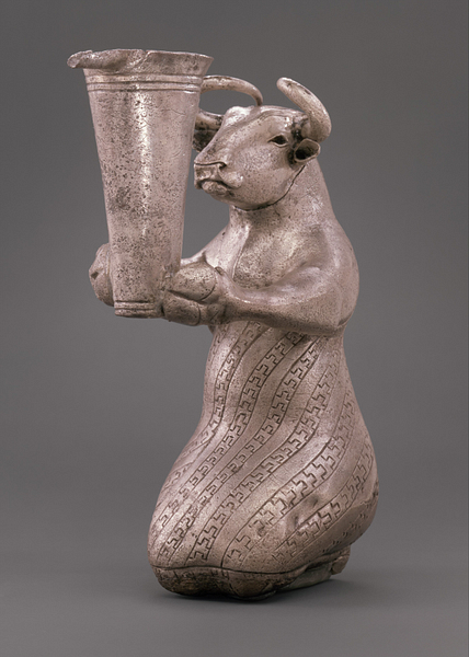 Kneeling Bull Holding Vessel