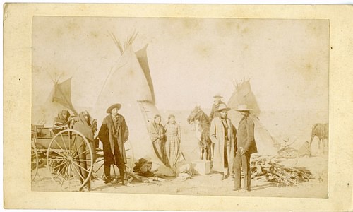Eight Sioux in Front of Tipis on the Pine Ridge Reservation