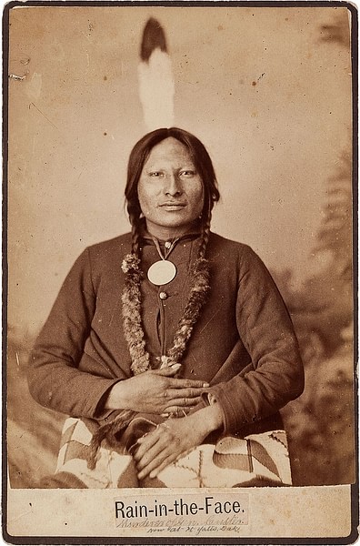 Sioux Warrior Rain-in-the-Face (by Orlando Scott Goff, Public Domain)
