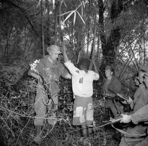 British Soldiers Arrest a Mau Mau Suspect