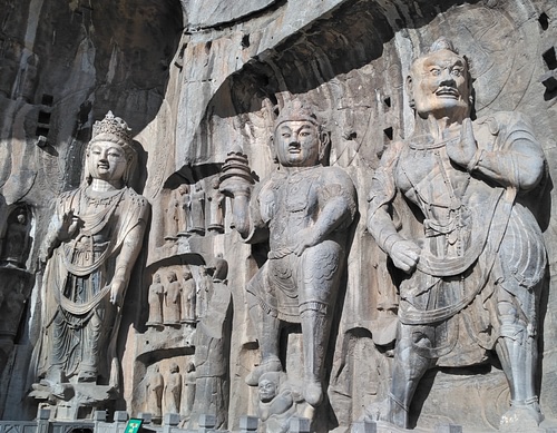 Longmen Grottoes - Attendants at Fengxiansi Cave (by Benjamin Oswald, CC BY-NC-SA)