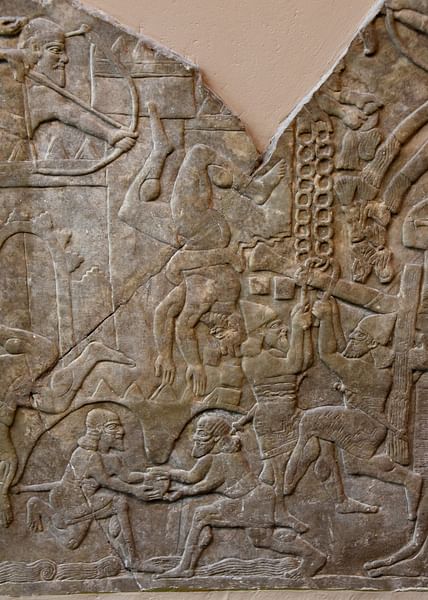 Assyrian Soldiers Attacking a City
