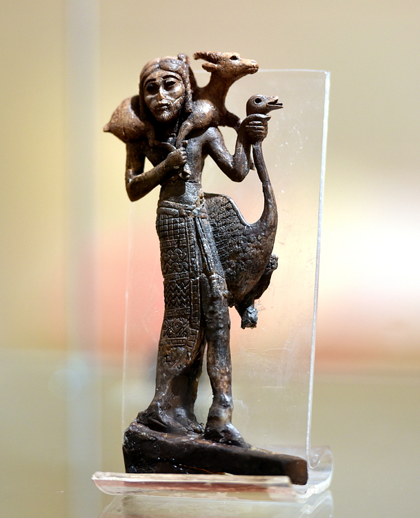 Ivory Figure of Syrian Man with an Ostrich & Goat, Nimrud