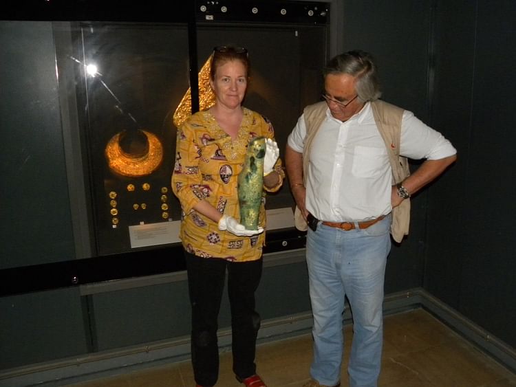 Professor Theodore Antikas with Laura-Wynn Antikas Holding the Shorter Greave from the Royal Tomb of Vergina