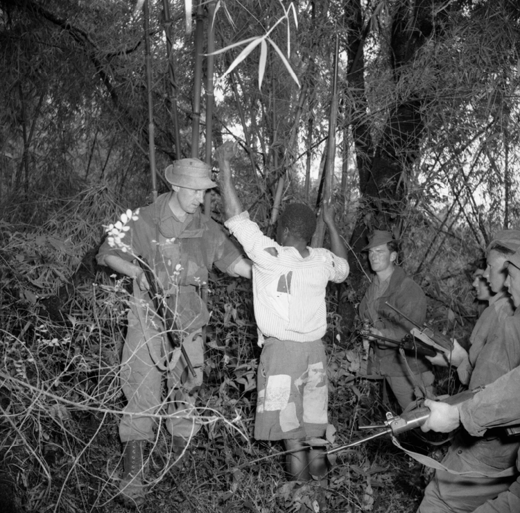 British Soldiers Arrest a Mau Mau Suspect