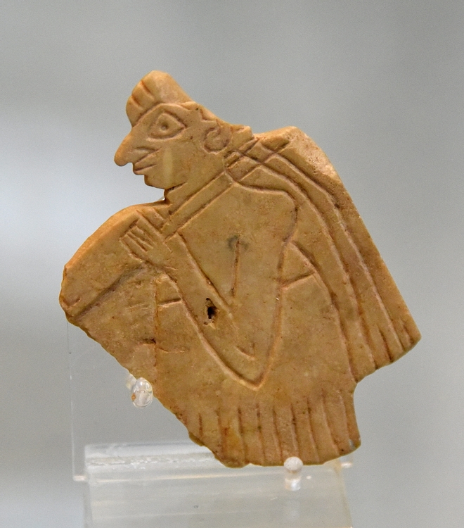 Sumerian Man Holding a Pole