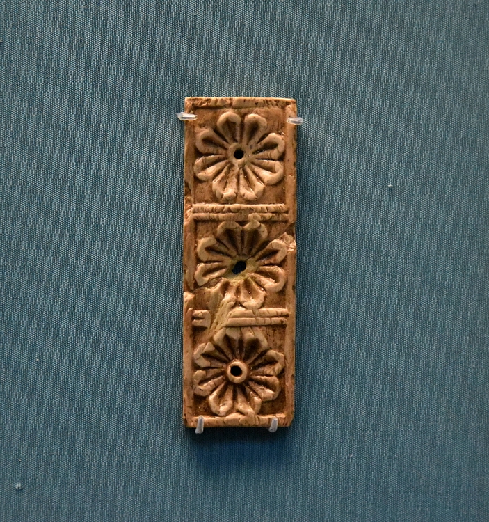 Small Nimrud Ivory Panel of Three Rosettes