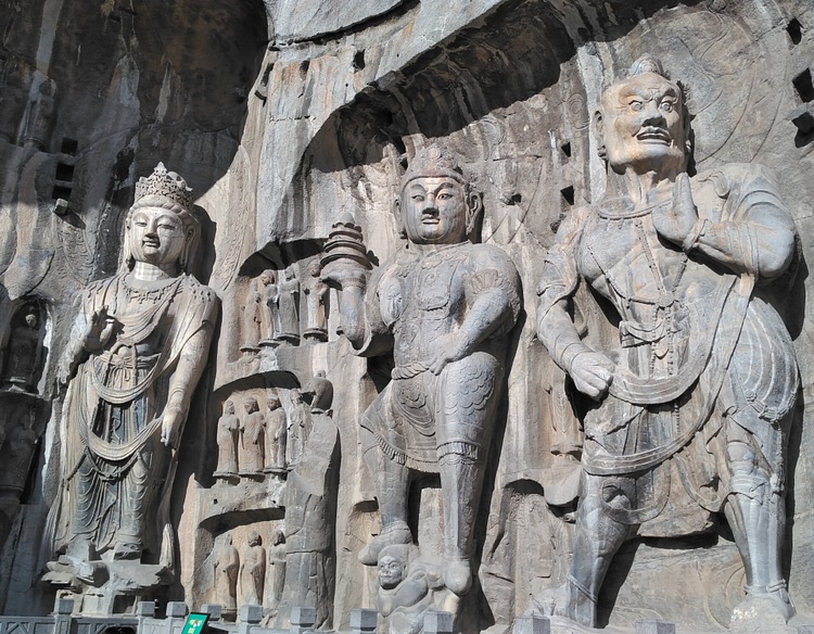 Longmen Grottoes - Attendants at Fengxiansi Cave