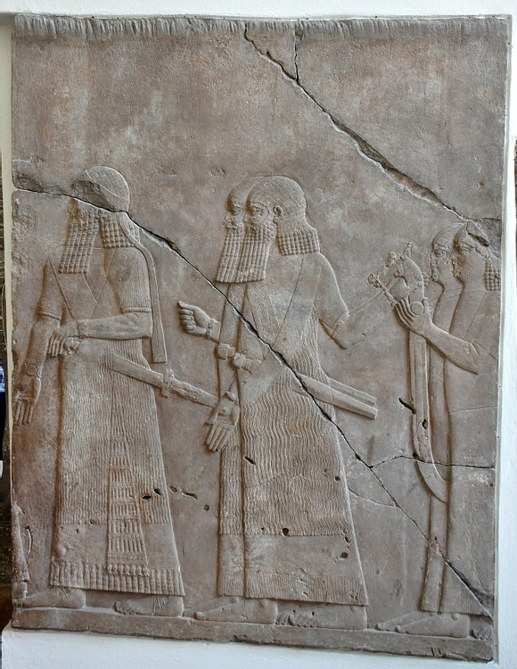 Assyrian Courtiers Carrying the King's Throne