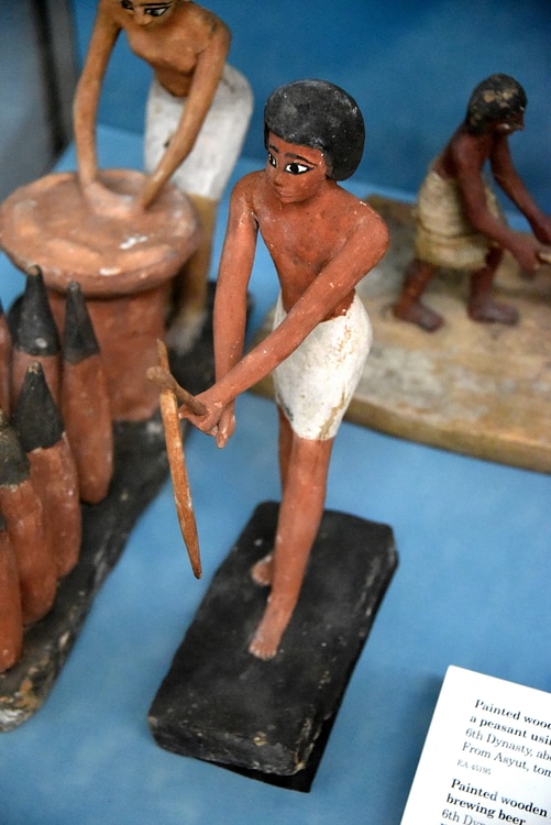 Egyptian Statuette of a Peasant Using a Hoe
