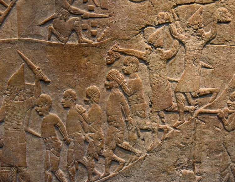 Assyrian Soldiers Holding Decapitated Heads of Nubian Soldiers