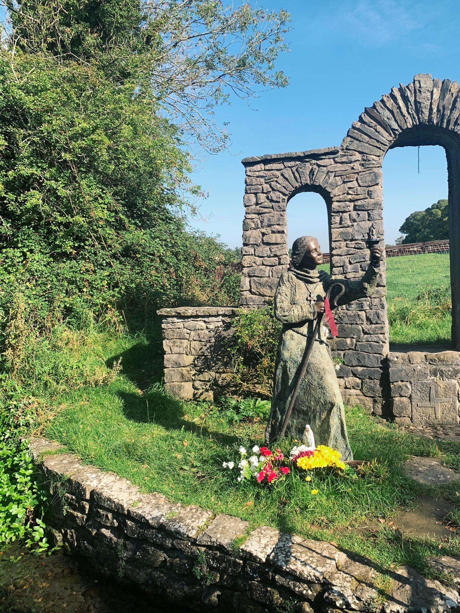 Statue of Brigid at Saint Brigid's Well, Kildare (Illustration) - World ...
